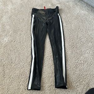 SPANX faux leather legging with white stripe sides. Size medium